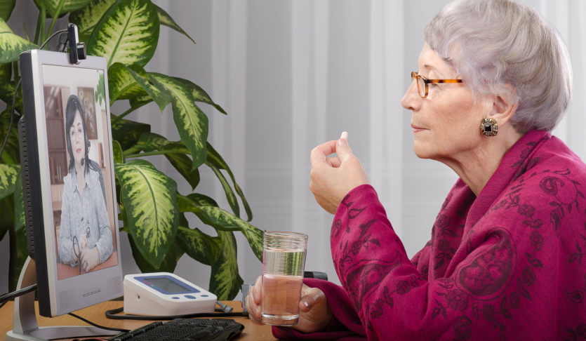 senior woman talking to a care representative